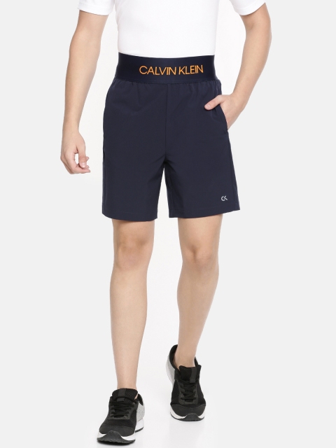 

Calvin Klein Jeans Men Navy Blue Solid Regular Fit Sports Training Shorts
