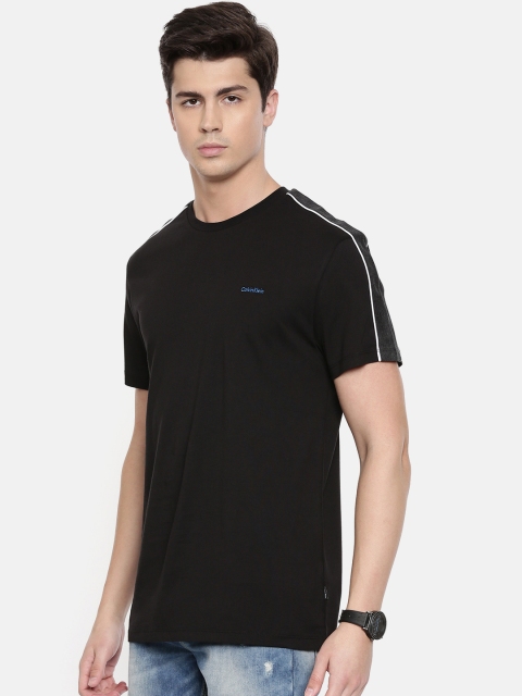 

Calvin Klein Jeans Men Black Solid Round Neck T-shirt