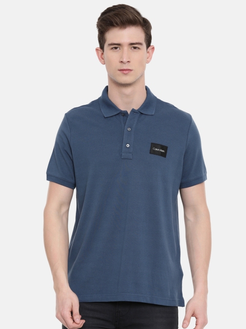 

Calvin Klein Jeans Men Teal Blue Solid Polo Collar T-shirt