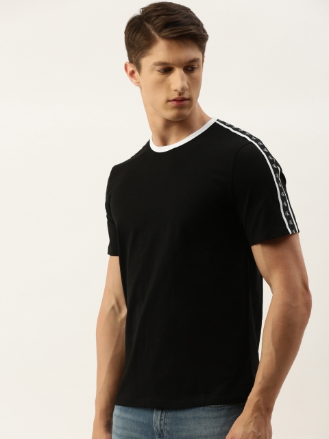 

Calvin Klein Jeans Men Black Solid Round Neck T-shirt