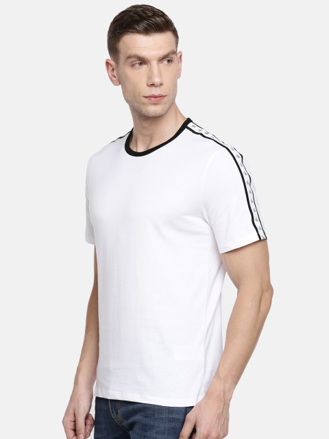 

Calvin Klein Jeans Men White Solid Round Neck T-shirt