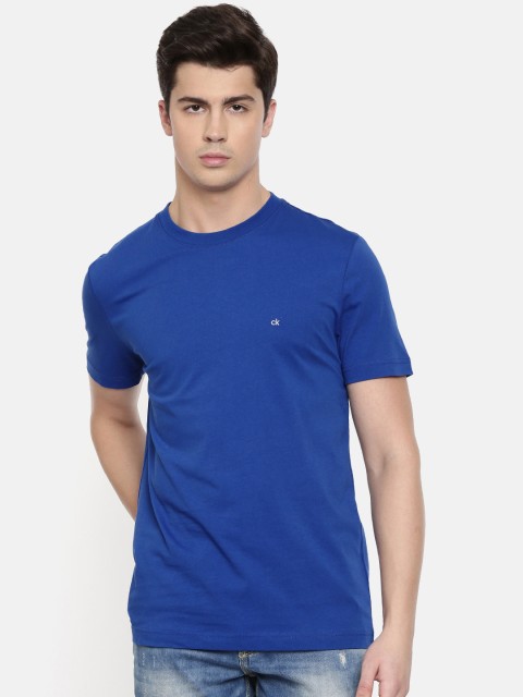 

Calvin Klein Jeans Men Blue Solid Round Neck T-shirt