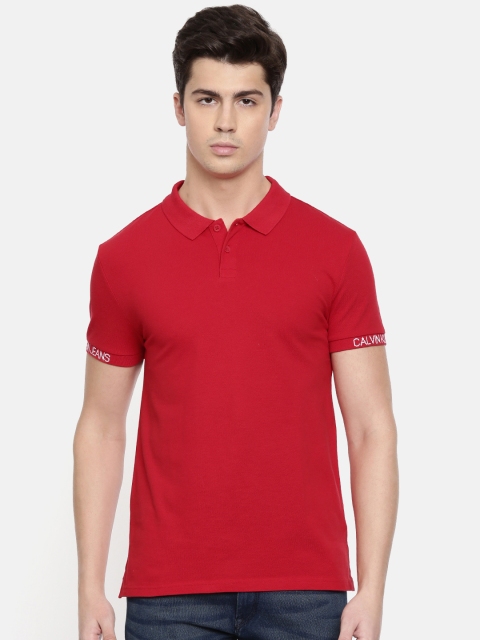 

Calvin Klein Jeans Men Red Solid Round Neck T-shirt
