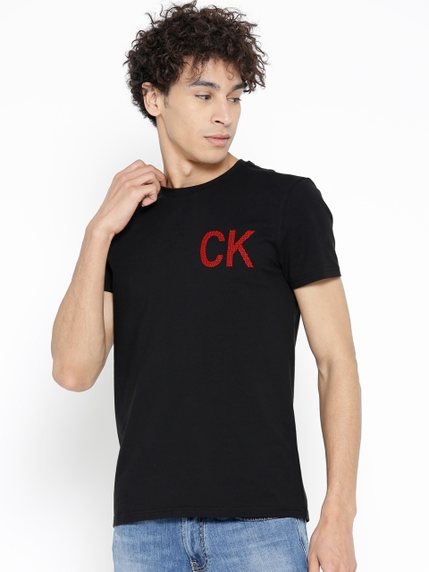 

Calvin Klein Jeans Men Black Solid Round Neck T-shirt