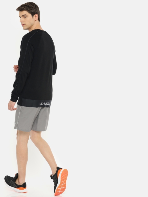

Calvin Klein Jeans Performance Men Black Solid Sweatshirt