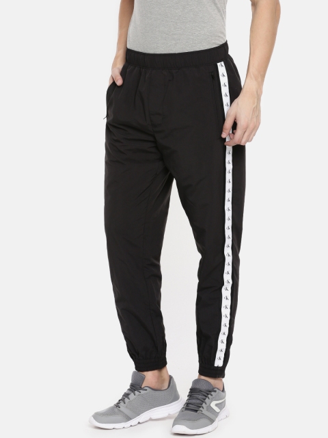 

Calvin Klein Jeans Men Solid Regular Fit Joggers, Black
