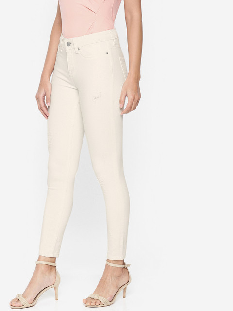 

Vero Moda Women Cream-Coloured Skinny Fit Mid-Rise Low Distress Stretchable Cropped Jeans