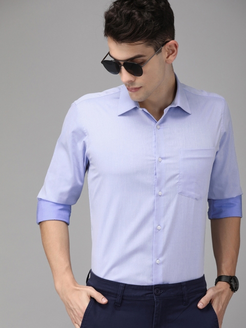 

Van Heusen Men Blue Slim Fit Solid Smart Casual Shirt