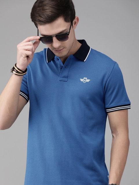 

The Roadster Lifestyle Co Men Blue Solid Polo Collar Pure Cotton T-shirt