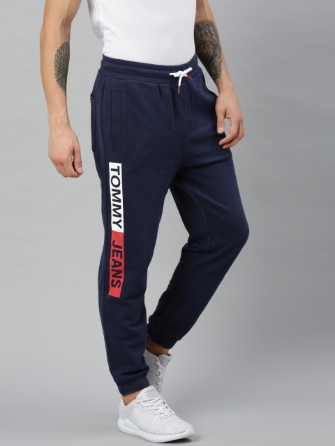 

Tommy Hilfiger Men Navy Blue Solid Slim Fit Joggers with Printed Detail