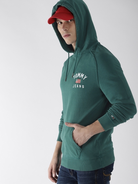 

Tommy Hilfiger Men Green Solid Hooded Sweatshirt