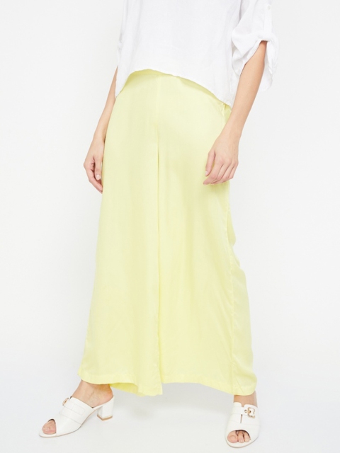 

Melange by Lifestyle Women Yellow Solid Flared Palazzos