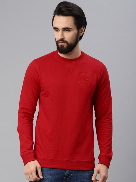 

Peter England Men Red Solid Sweatshirt