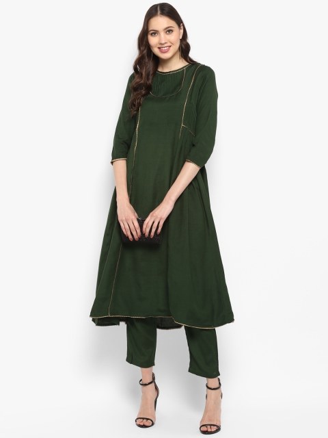 

Janasya Women Green Solid Kurta with Trousers
