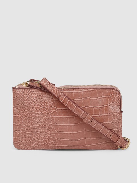 

Accessorize Pink Textured Sling Bag