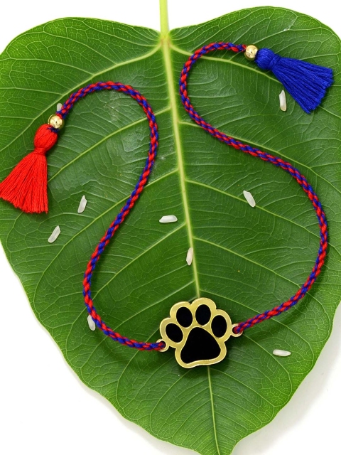 

Krafted with Happiness Black Paw Shaped Rakhi