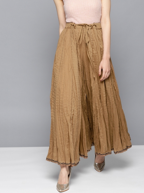 

Ritu Kumar Women Mustard Brown Solid Flared Palazzos