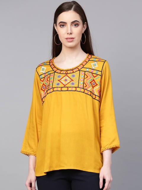 

Bhama Couture Women Mustard Yellow Embroidered Detail Solid A-Line Top