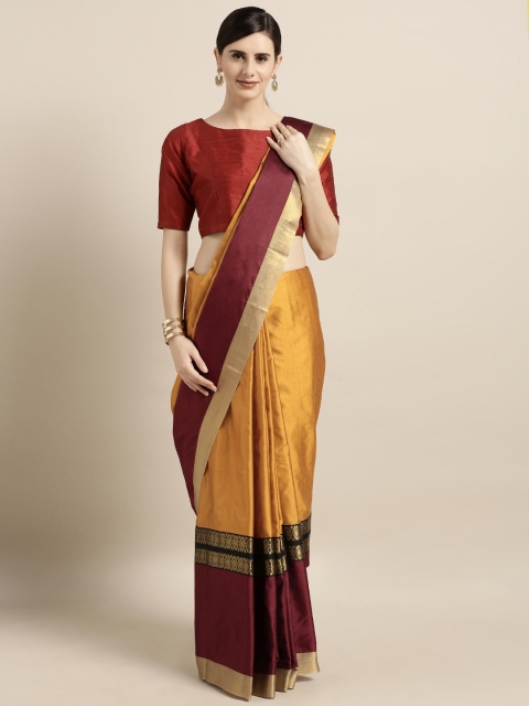 

GoSriKi Mustard Yellow & Maroon Silk Blend Solid Saree