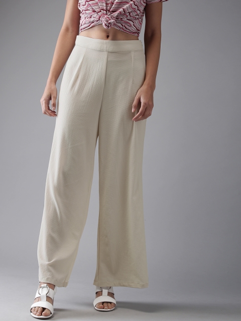 

Moda Rapido Women Beige Regular Fit Solid Parallel Trousers