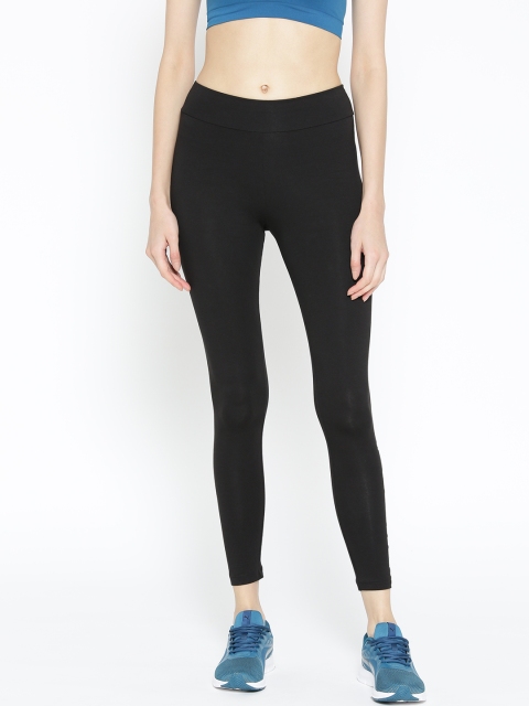 

Puma Women Black Solid Essentials+ Graphic Tights