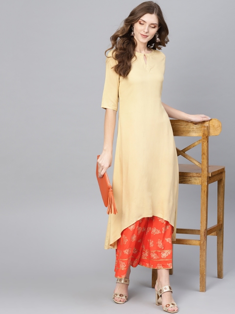 

Libas Women Beige & Orange Solid Kurta with Palazzos