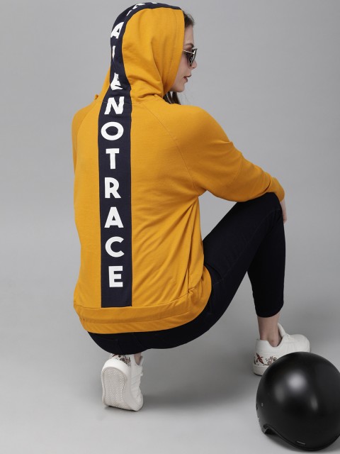 

Roadster Women Mustard Yellow Solid Hooded Sweatshirt With Printed Back