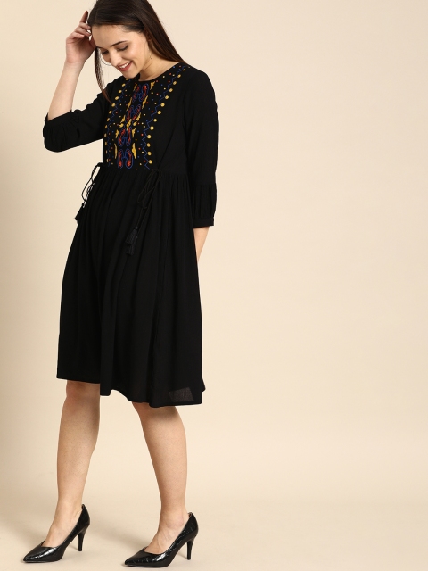 

DressBerry Women Black Solid Fit and Flare Dress With Embroidered Detail