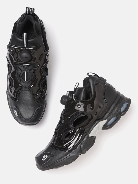 

Reebok Classic Unisex Black Solid Fury DMX L Millennium Slip-On Sneakers