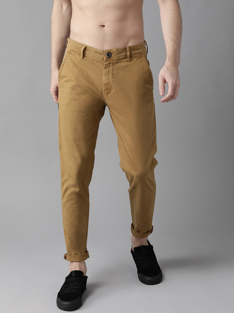 

Roadster Men Khaki Regular Fit Self Striped Regular Trousers