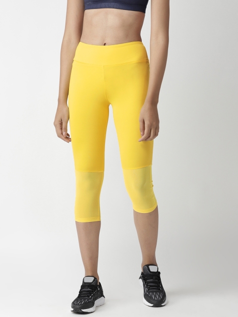 

Chkokko Women Yellow Solid High-Rise Slim Fit Capris