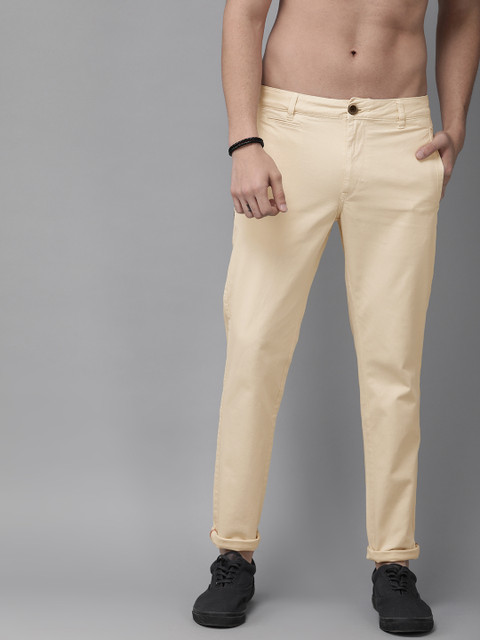 

The Roadster Lifestyle Co Men Beige Regular Fit Solid Regular Trousers