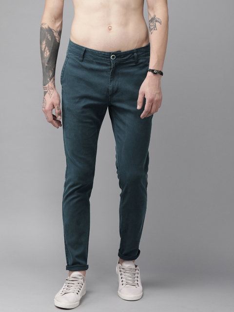 

The Roadster Lifestyle Co Men Blue Regular Fit Self-Striped Regular Trousers