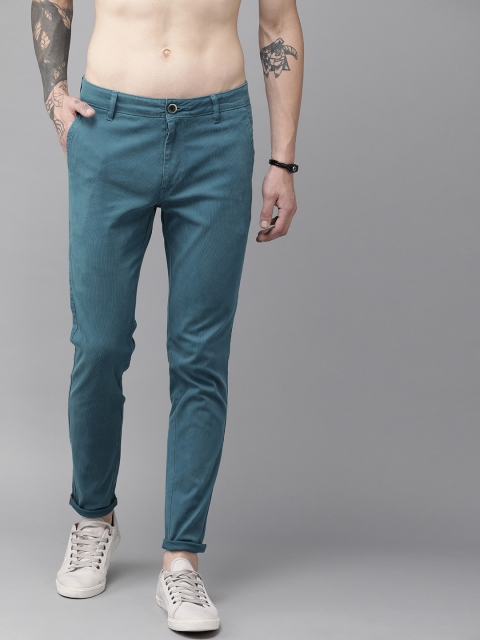 

The Roadster Lifestyle Co Men Blue Solid Trousers