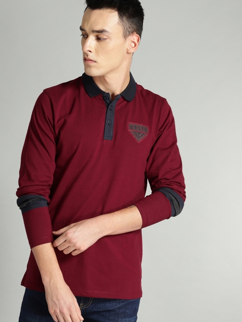 

Roadster Men Maroon Solid Polo Collar T-shirt