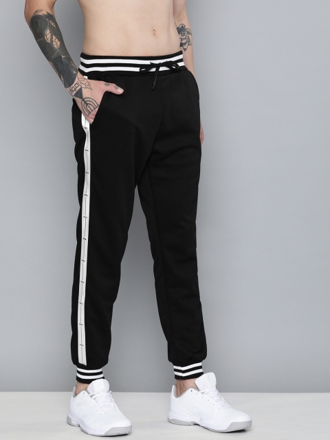 

HRX by Hrithik Roshan Men Black Solid Lifestyle Mid-Rise Joggers