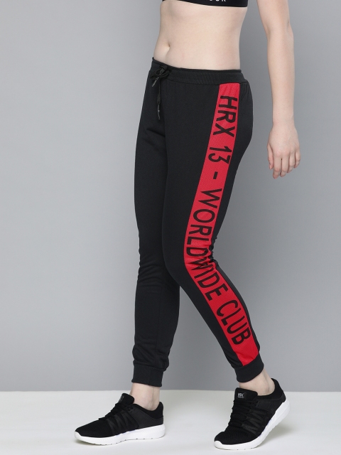 

HRX by Hrithik Roshan Women Black Solid Joggers With Side Stripes