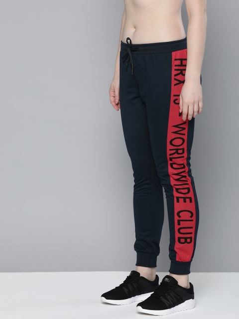 

HRX by Hrithik Roshan Women Navy Blue Solid Joggers With Side Stripes