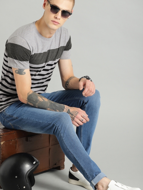 

Roadster Men Grey Melange & Black Striped Round Neck T-shirt