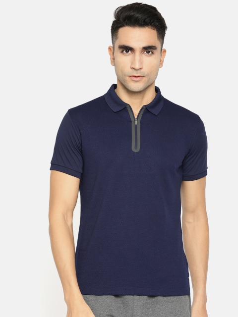 

Peter England Casuals Men Navy Blue Solid Polo Collar T-shirt