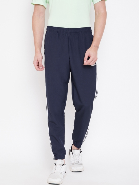 

ADIDAS Men Navy Blue Essentials 3-Stripes Solid Wind Track Pants