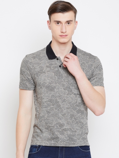 

Monte Carlo Men Beige & Black Self Design Polo Collar T-shirt