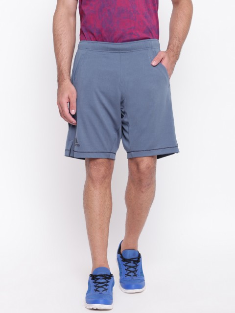 

ADIDAS Men Blue Self Design Club 9 Inch Tennis Shorts