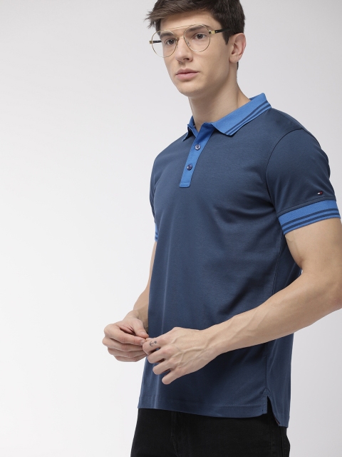 

Tommy Hilfiger Men Navy Blue Regular Fit Solid Polo Collar T-shirt