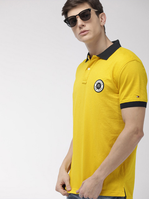 

Tommy Hilfiger Men Mustard Yellow Self Design Regular FitPolo Collar T-shirt