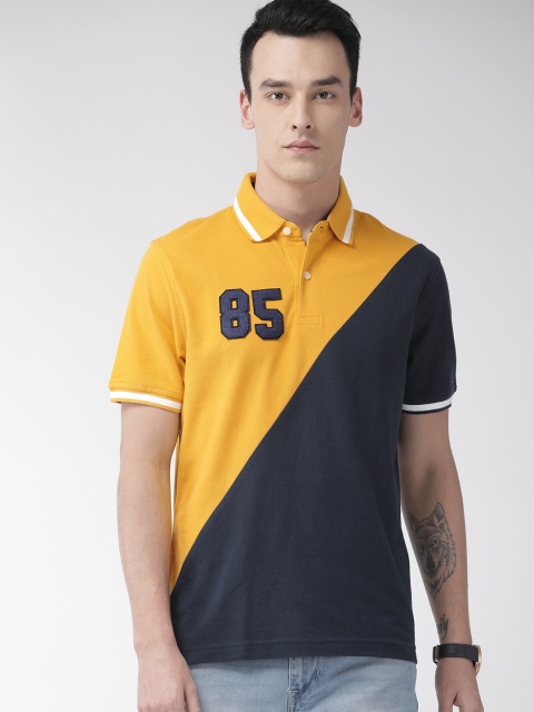 

Tommy Hilfiger Men Navy Blue & Mustard Yellow Colourblocked Custom Fit Polo Collar T-shirt