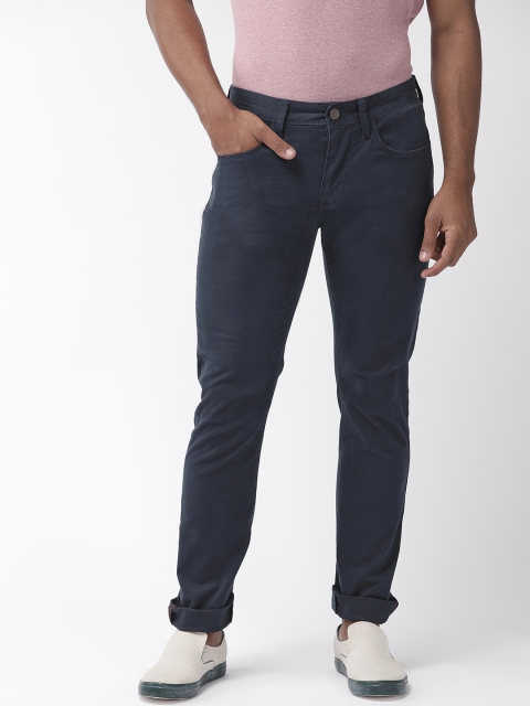 

Tommy Hilfiger Men Navy Straight Fit Solid Chinos, Navy blue