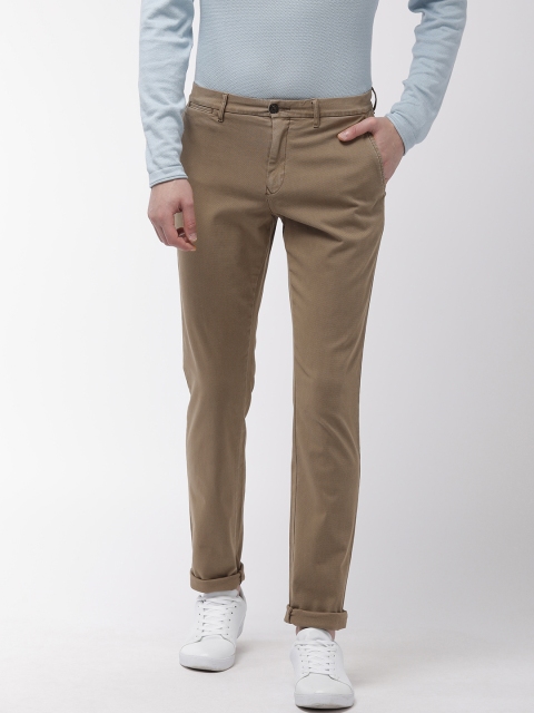 

Tommy Hilfiger Men Brown Regular Fit Solid Chinos