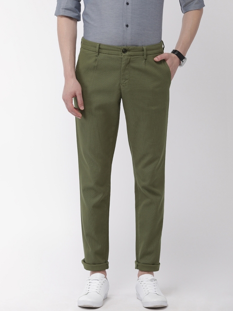 

Tommy Hilfiger Men Olive Green Regular Fit Textured Regular Trousers