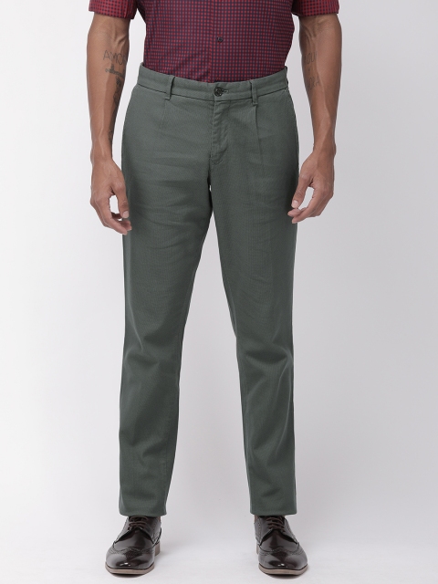 

Tommy Hilfiger Men Charcoal Grey Regular Fit Textured Regular Trousers